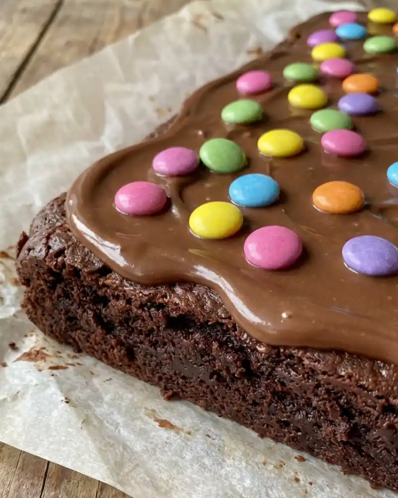 Fudgy gluten-free cosmic brownies topped with rainbow sprinkles