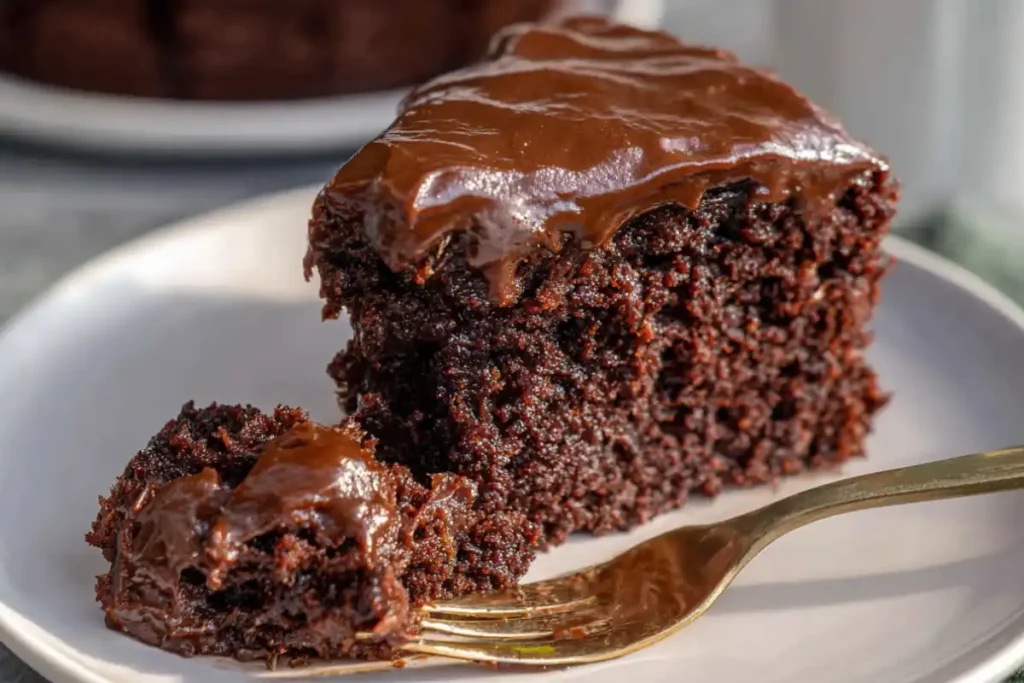Gluten free chocolate zucchini cake slice with fudge frosting