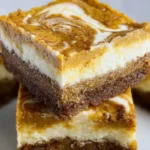 Gluten-free pumpkin cheesecake bars with graham cracker crust.