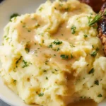 creamy gluten-free mashed potatoes with chives in bowl