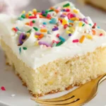 gluten free dairy free vanilla cake sliced on a plate